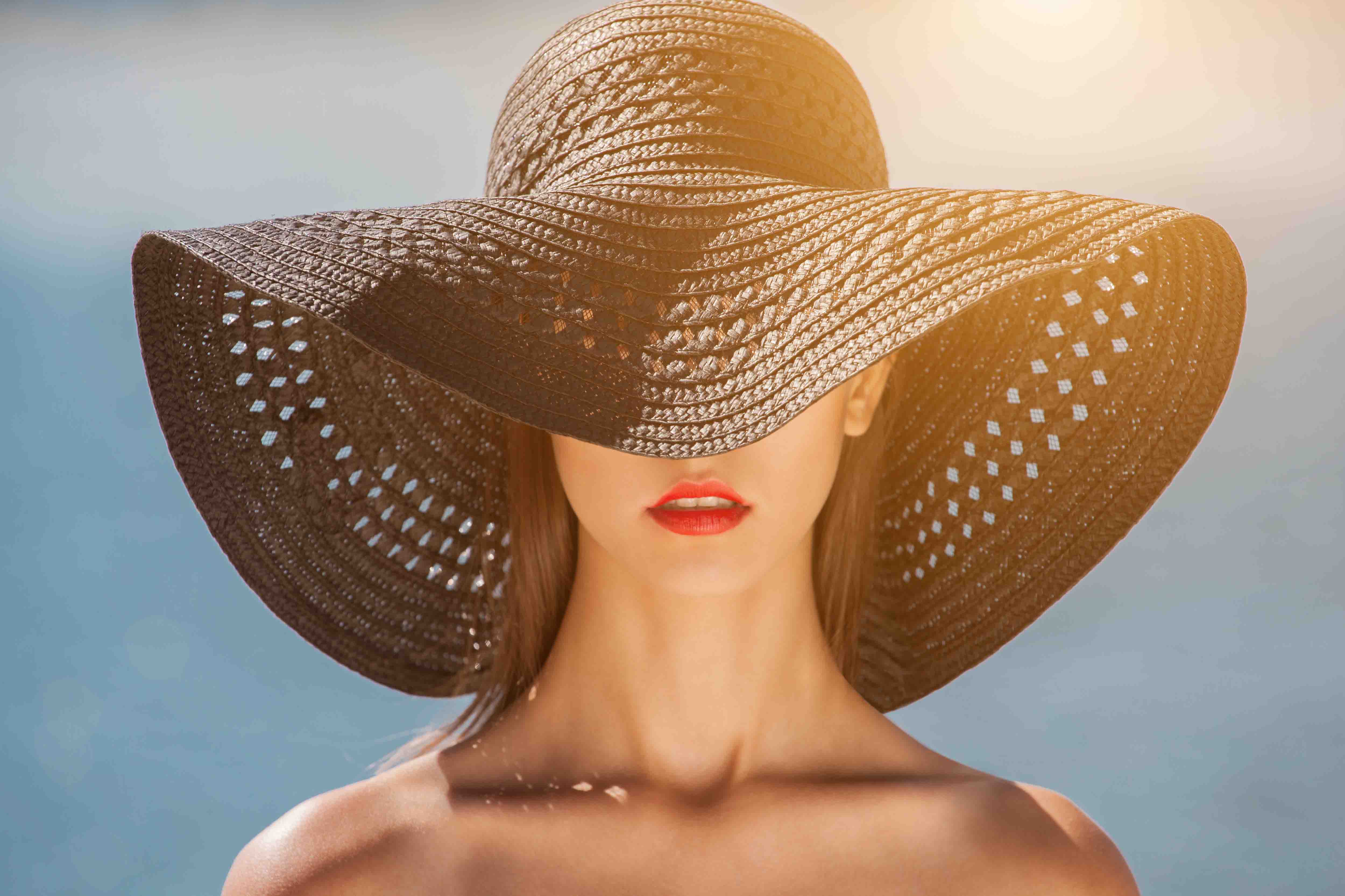 Protect-your-skin-from-sun-damage Girl in a black hat