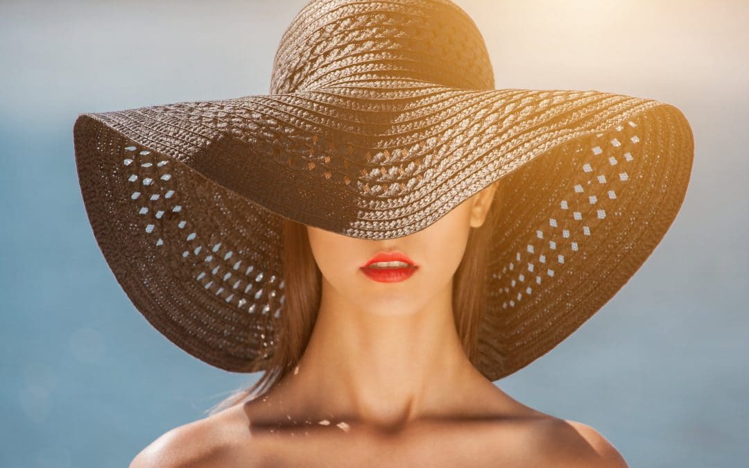 Woman with a large blacksummer hat